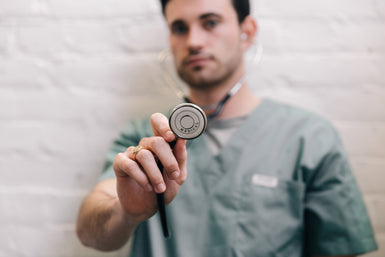 files/male-doctor-holding-out-stethoscope.jpg